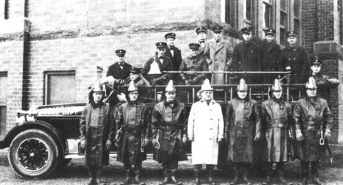 Old picture of fire fighters on 1925 fire truck